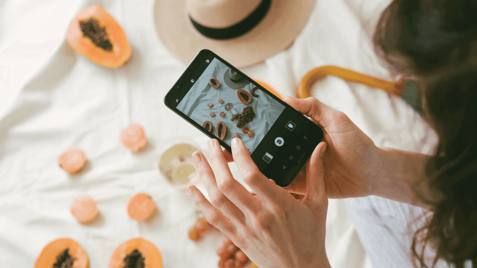 A person taking a picture of food
AI-generated content may be incorrect.